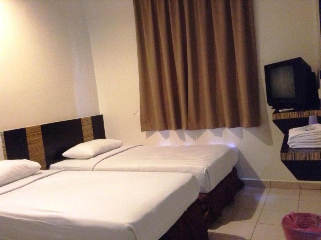 Hotel Traveller Kota Kinabalu Kamer foto